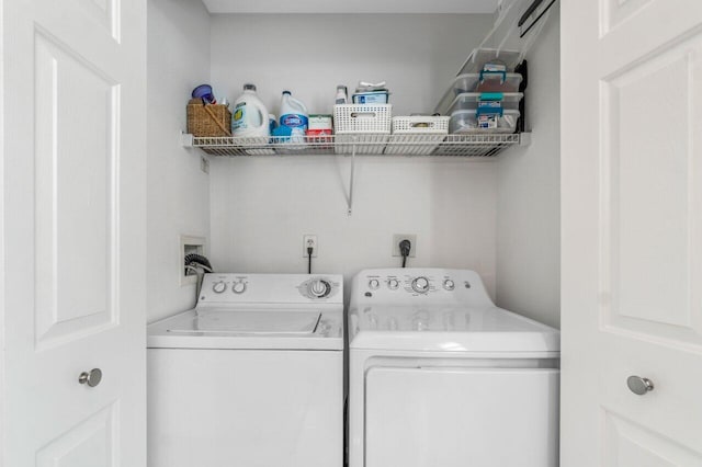 laundry room with washer and clothes dryer