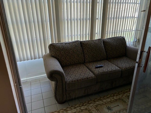 living room with light tile patterned flooring