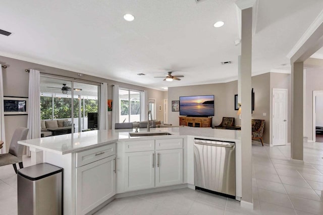 120 Jones Creek Dr, Jupiter, FL 33458 - kitchen featuring a ceiling fan, crown molding, stainless steel dishwasher, a sink, and open floor plan