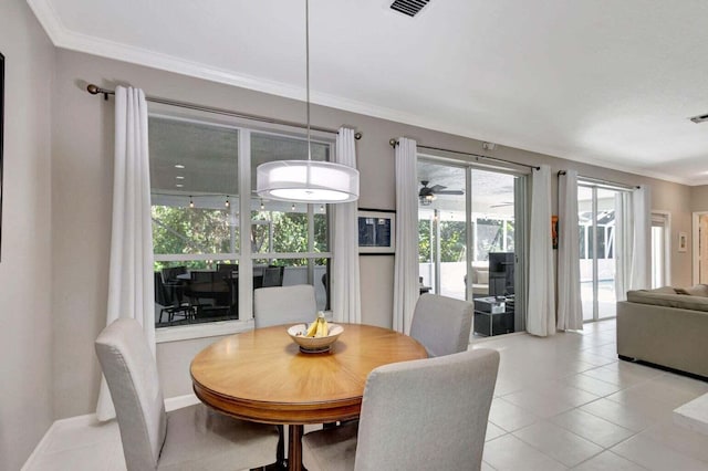 120 Jones Creek Dr, Jupiter, FL 33458 - dining area with light tile patterned floors, ornamental molding, and visible vents