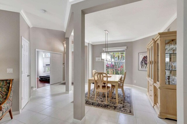 120 Jones Creek Dr, Jupiter, FL 33458 - dining area featuring light tile patterned flooring, baseboards, and ornamental molding