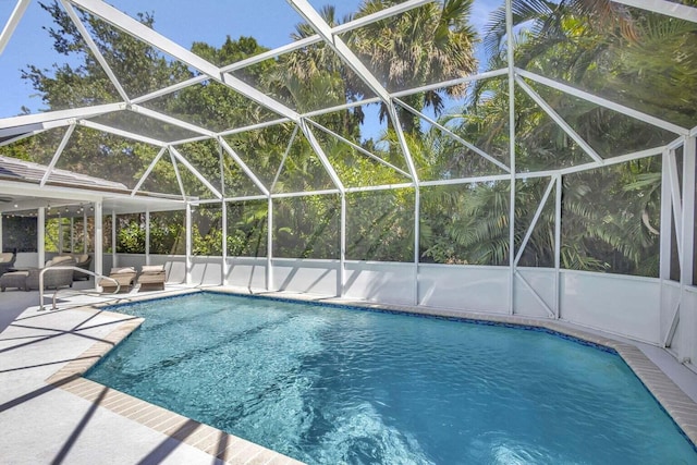 120 Jones Creek Dr, Jupiter, FL 33458 - outdoor pool with glass enclosure, a patio area, and outdoor lounge area