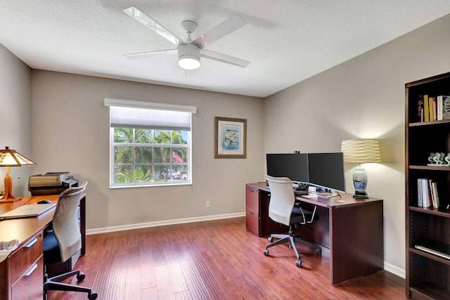 office area with hardwood / wood-style flooring, ceiling fan, and a textured ceiling