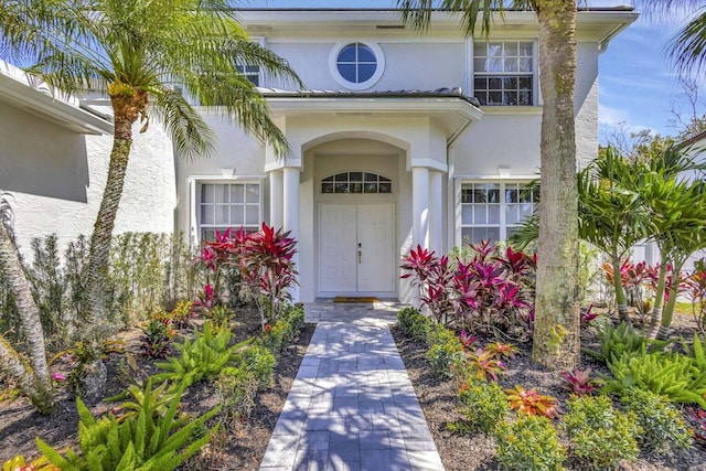 120 Jones Creek Dr, Jupiter, FL 33458 - entrance to property featuring stucco siding