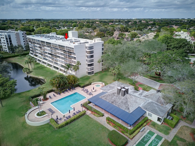 birds eye view of property featuring a water view