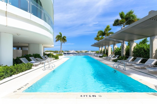 view of swimming pool featuring a patio