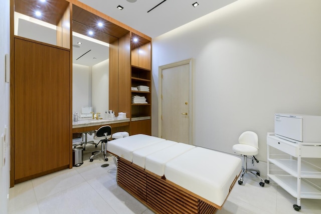 bedroom featuring light tile patterned floors