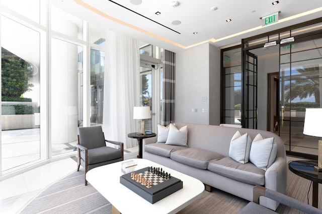 tiled living room with expansive windows