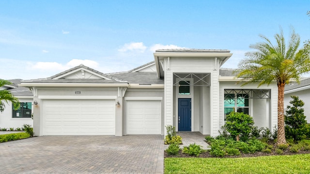 view of front of property featuring a garage