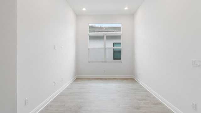 unfurnished room featuring light wood-type flooring