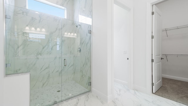 bathroom featuring an enclosed shower