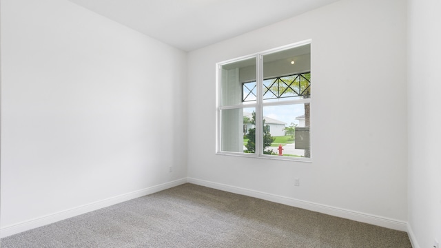 view of carpeted spare room