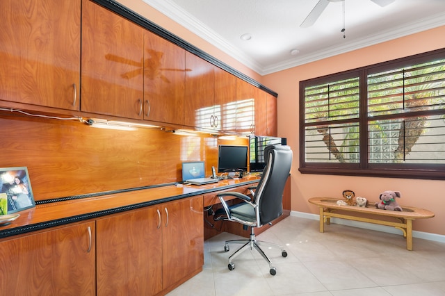 office area with ornamental molding, light tile patterned floors, and ceiling fan