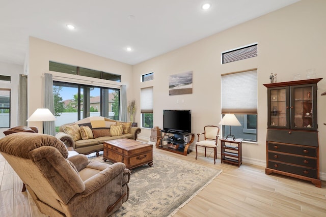 living room with light hardwood / wood-style floors