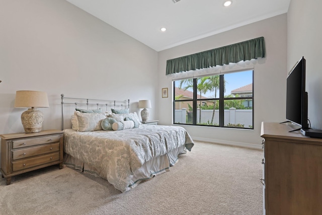 carpeted bedroom featuring high vaulted ceiling