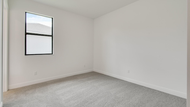 5237 Saint Vincent Ln, Westlake, FL 33470 - spare room with baseboards and carpet