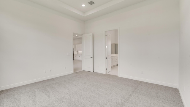 5237 Saint Vincent Ln, Westlake, FL 33470 - unfurnished bedroom featuring light colored carpet, baseboards, recessed lighting, and connected bathroom