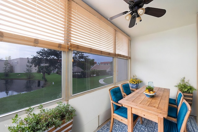 sunroom / solarium with ceiling fan