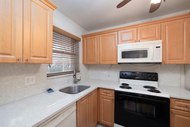 kitchen featuring white appliances, backsplash, sink, and ceiling fan