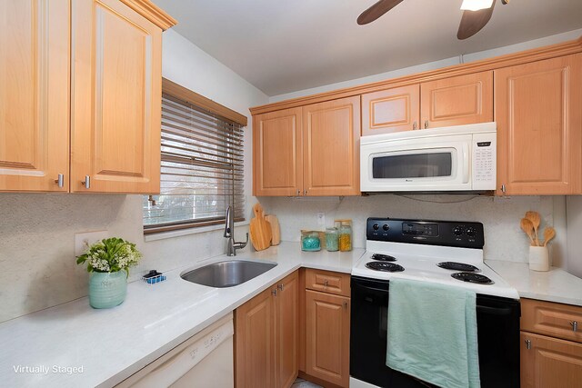 kitchen featuring white appliances, backsplash, sink, and ceiling fan