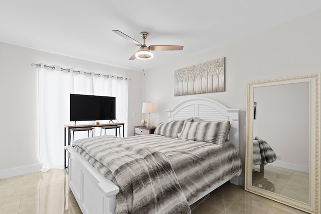 bedroom featuring light tile patterned flooring and ceiling fan