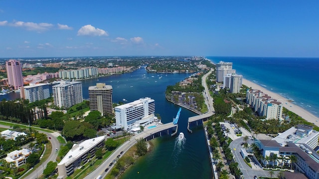 bird's eye view with a water view and a view of the beach