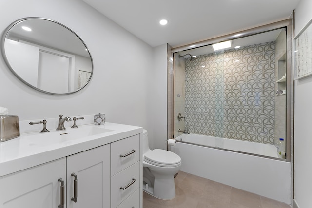 full bathroom with toilet, tile patterned flooring, bath / shower combo with glass door, and vanity