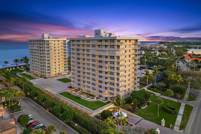 outdoor building at dusk with a water view