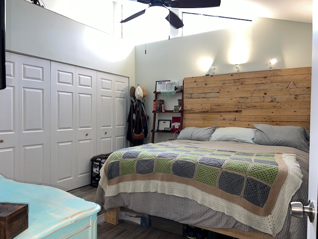 bedroom featuring a closet, dark hardwood / wood-style flooring, and ceiling fan