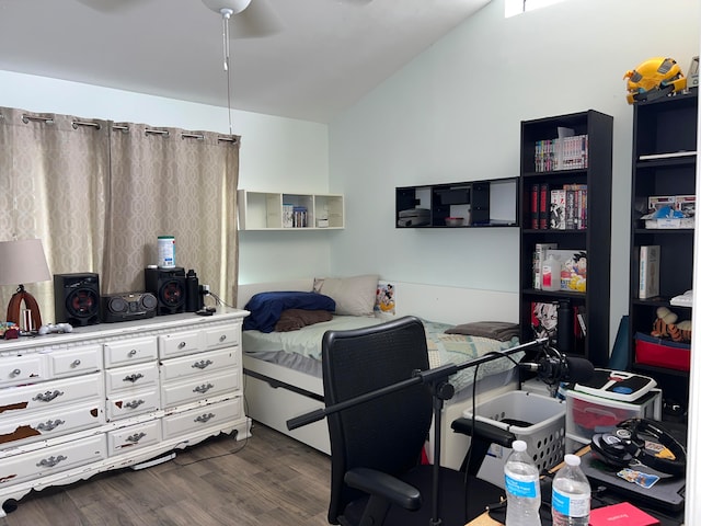 bedroom with lofted ceiling, dark hardwood / wood-style flooring, and ceiling fan