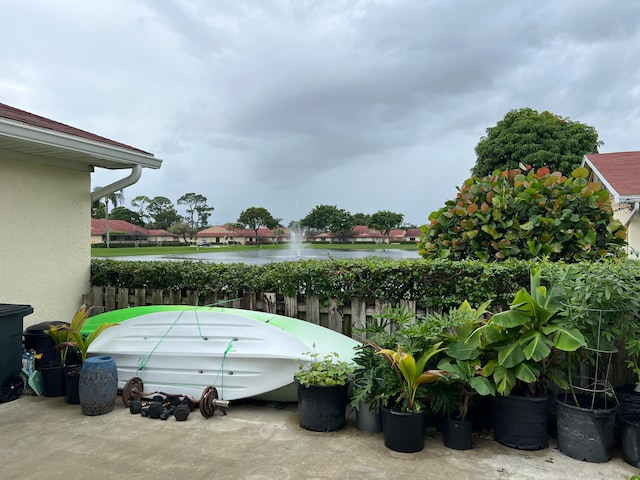 exterior space with a water view