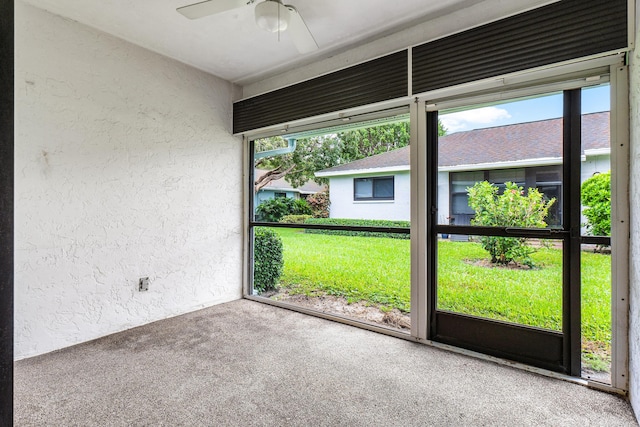 4360 Eucalyptus Tree Ct Unit A, Boynton Beach, FL 33436 - spare room with a healthy amount of sunlight, a textured wall, carpet, and ceiling fan
