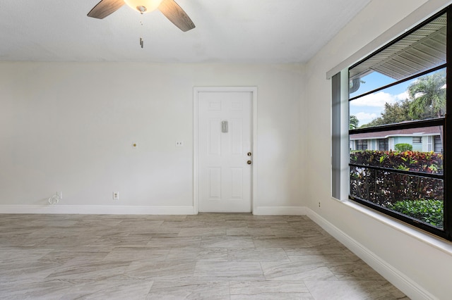 empty room with ceiling fan