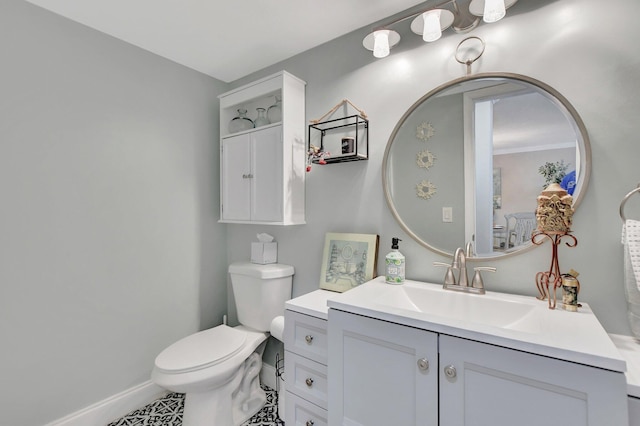 bathroom with tile patterned floors, vanity, and toilet