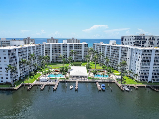 birds eye view of property featuring a water view