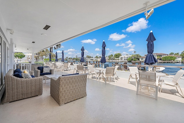 view of patio / terrace featuring a water view