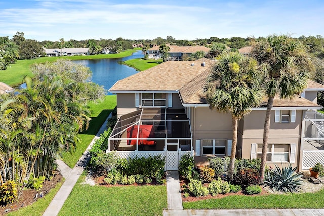 exterior space with a water view