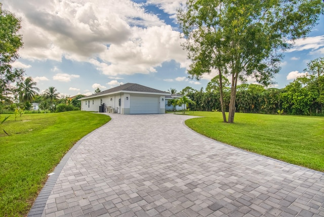 ranch-style house with a front yard and a garage