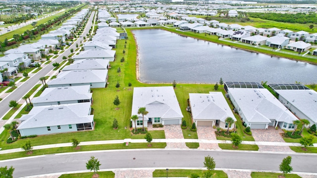 drone / aerial view with a water view