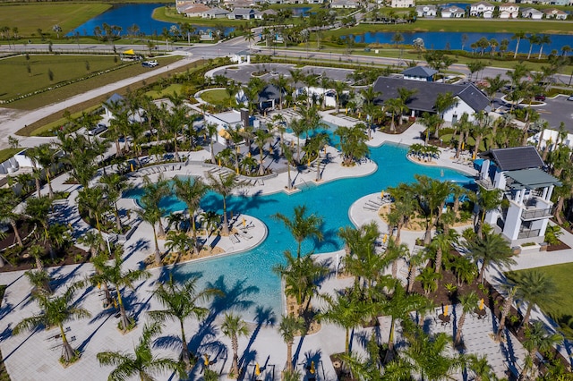 birds eye view of property featuring a water view