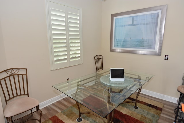 dining area featuring wood-type flooring