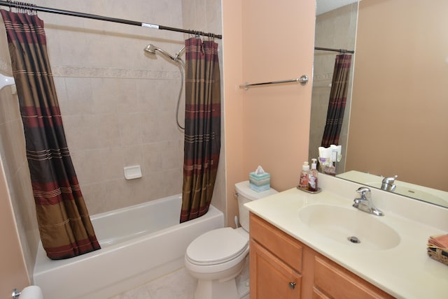 full bathroom featuring tile patterned floors, vanity, toilet, and shower / tub combo