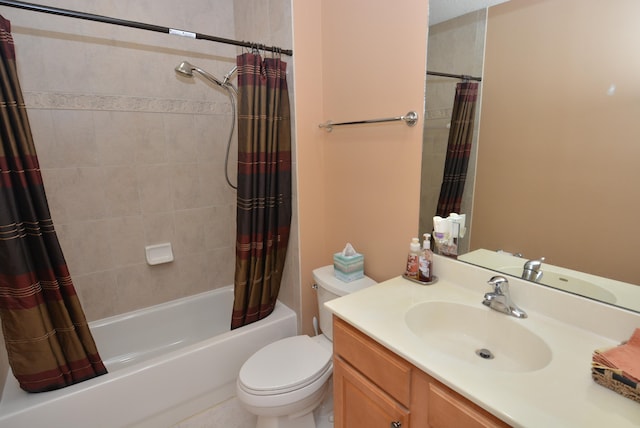 full bathroom featuring shower / bath combo, vanity, and toilet