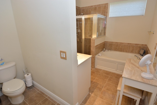 full bathroom featuring tile patterned flooring, vanity, toilet, and shower with separate bathtub