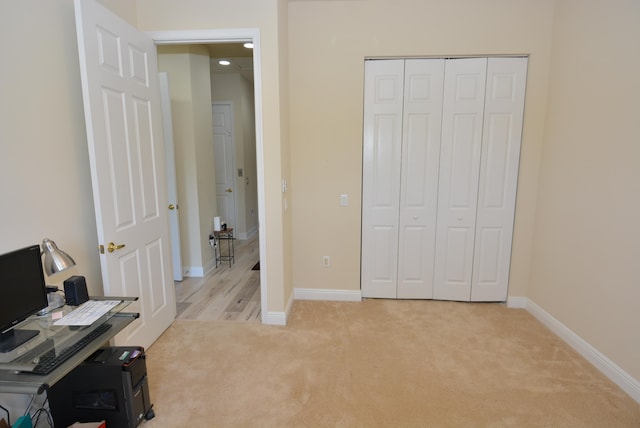 home office with light colored carpet