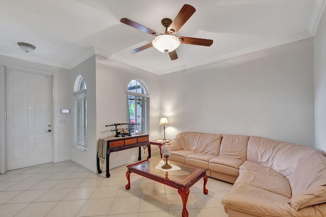 tiled living room featuring crown molding and ceiling fan