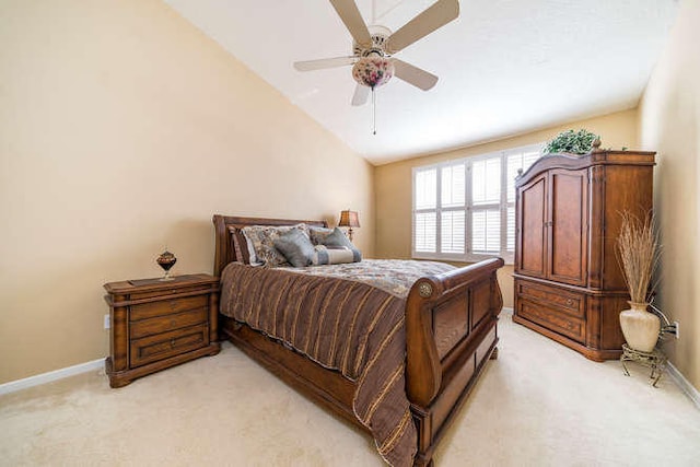 bedroom with light carpet, ceiling fan, and lofted ceiling