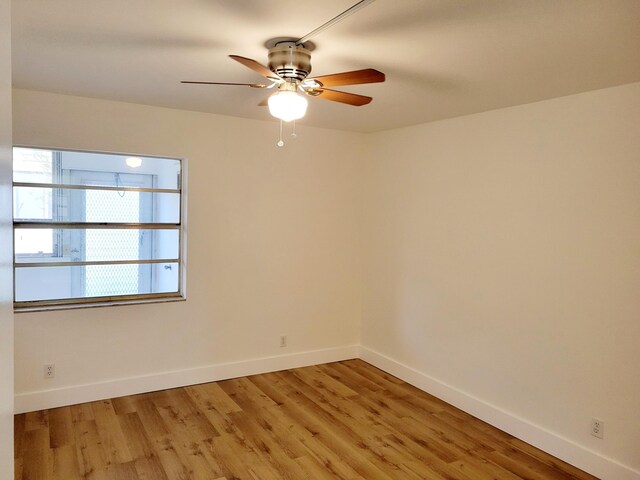 15 Burgundy Unit A, Delray Beach, FL 33484 - empty room with baseboards, light wood-style flooring, and ceiling fan