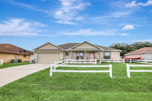 ranch-style home featuring a front lawn, central air condition unit, covered porch, and a garage