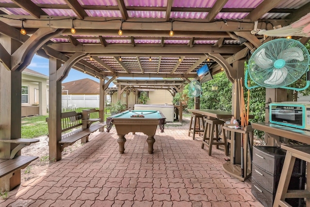 view of patio featuring a pergola and a bar